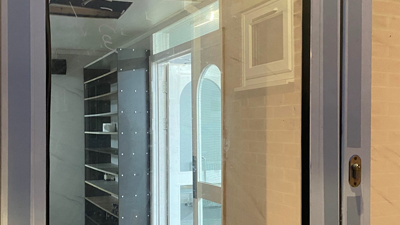 Close up of entrance and shoe rack area at YMC